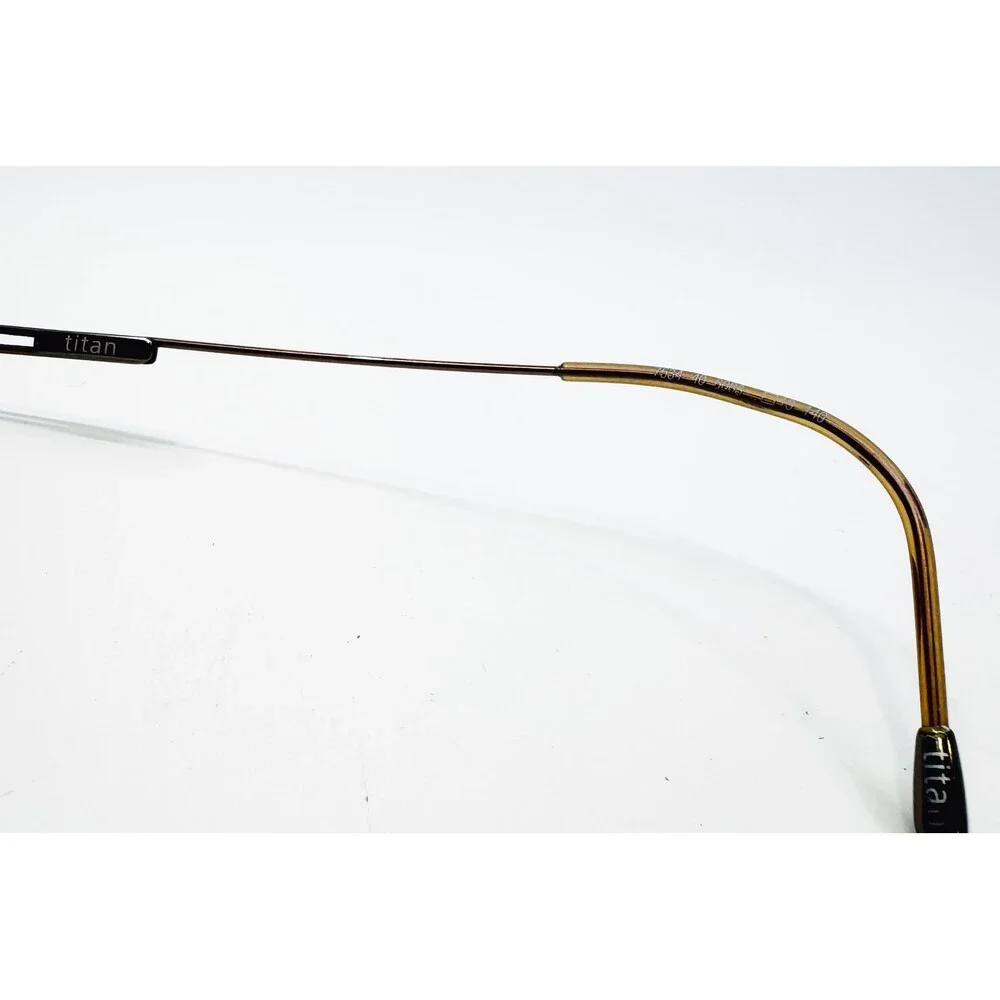 Silhouette Eyeglasses Unisex Brown Titan Rimless 7554 40 6056 140